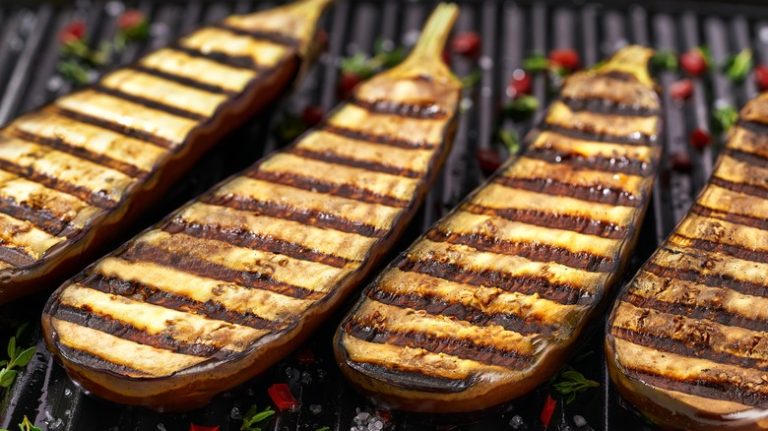 halved eggplant on grill