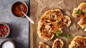 cauliflower steaks pictured alongside spices