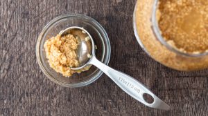 jar and bowl of minced garlic