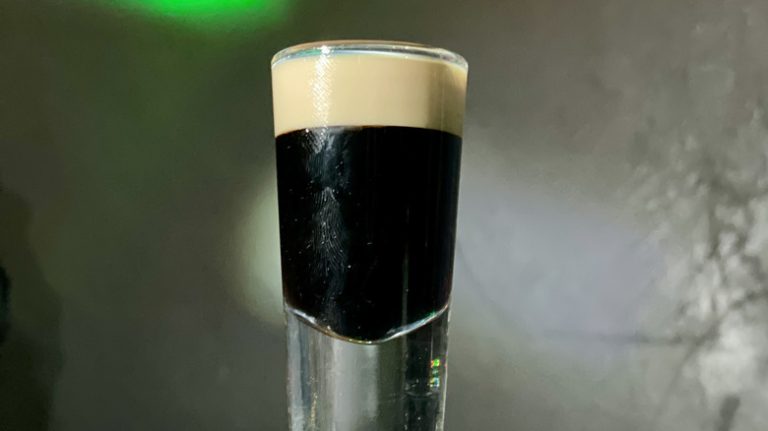 Baby guiness cocktail in shot glass