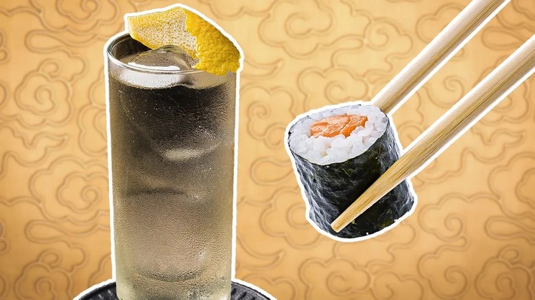 japanese highball and sushi with chopsticks