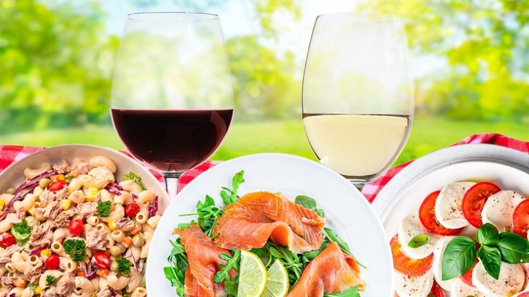 picnic salads with wine glasses