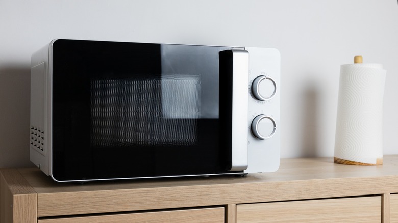 Microwave sitting on kitchen counter